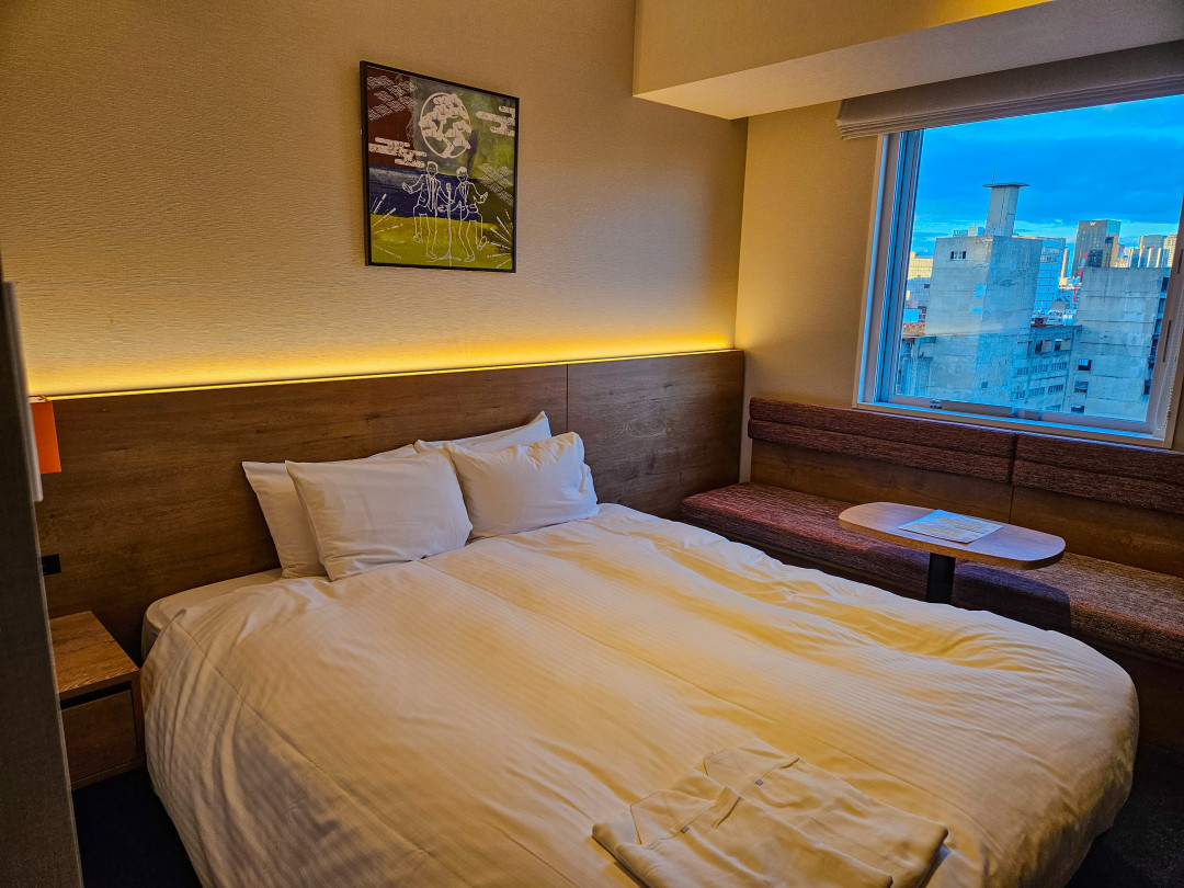 오사카 포르자호텔 침대 가운