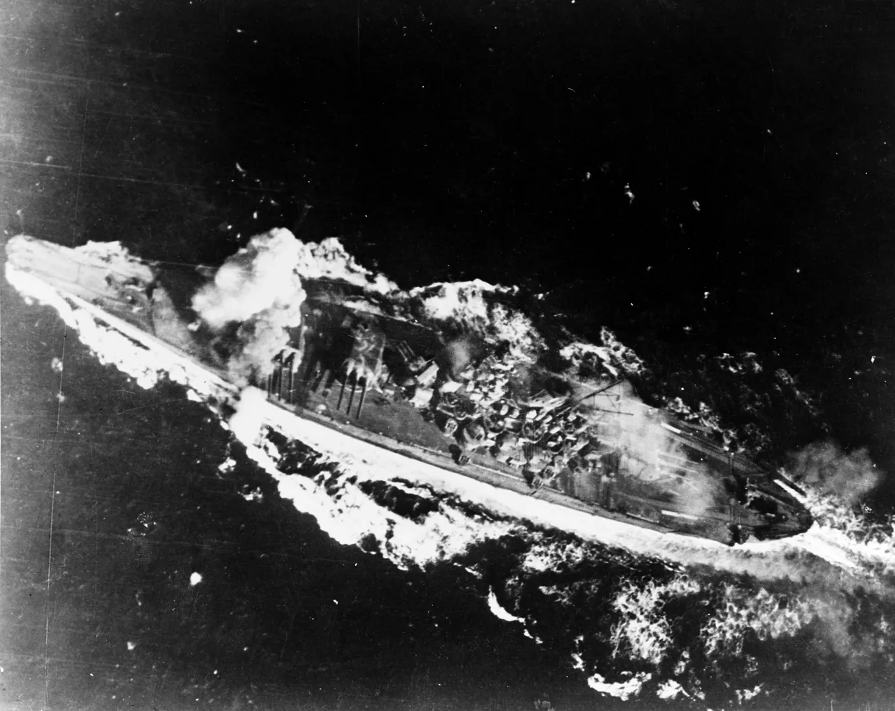 Japanese battleship Yamato is hit by a bomb during the Battle of the SibuyanSea 24 October 1944