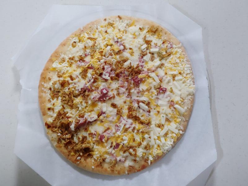 비닐 개봉후 냉동된 피자 사진