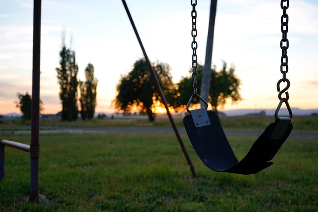 empty playground, empty swing