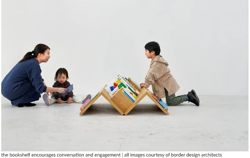 아이들이 손쉽게 책을 가져갈 수 있는 이동식 책꽂이 Mobile bookshelf with mountain-shaped fixtures invites children to explore independently