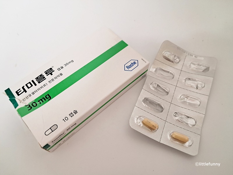 타미플루 약 상자와 알약 모양