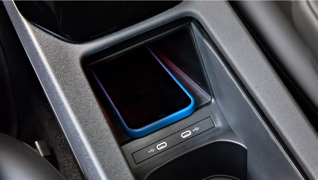 Wireless mobile phone charger and bluetooth handsfree