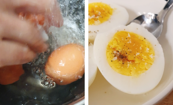 삶은 달걀을 찬물에 헹구고 껍질을 깐후 반으로 잘라 노른자우에 후추와 소금으로 간한 모습입니다.