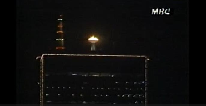 63빌딩 성화대에 성화가 빛나고 있는 밤이다.