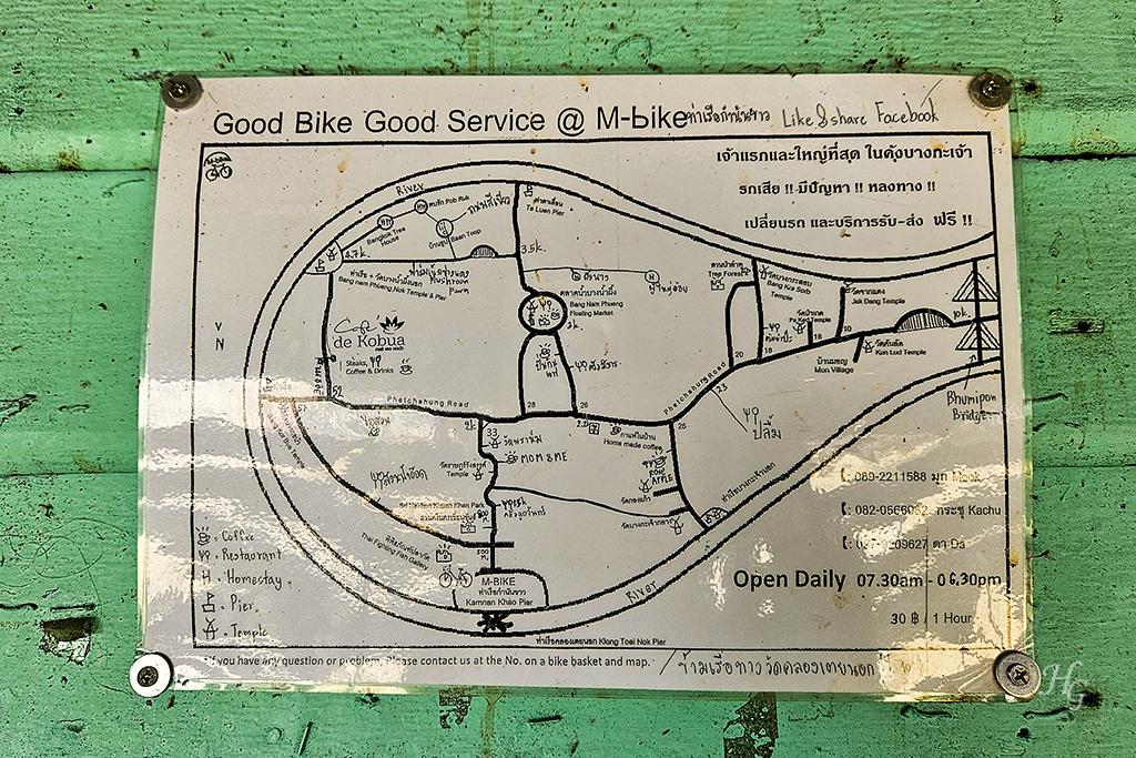 초록색 페인트 나무벽에 붙어 있는 m-bike 방카차오 지도