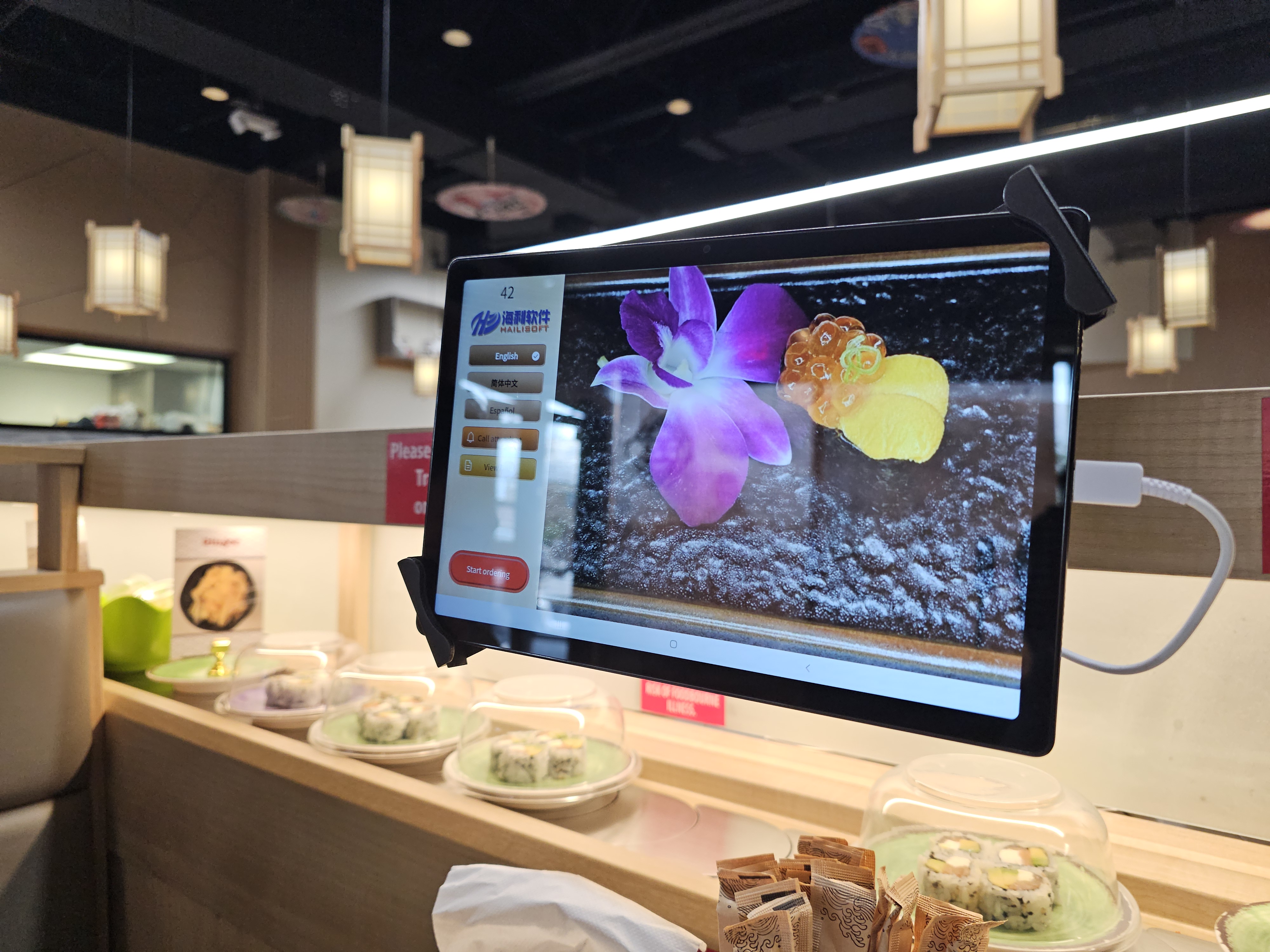 A tablet of Kawa Revolving Sushi