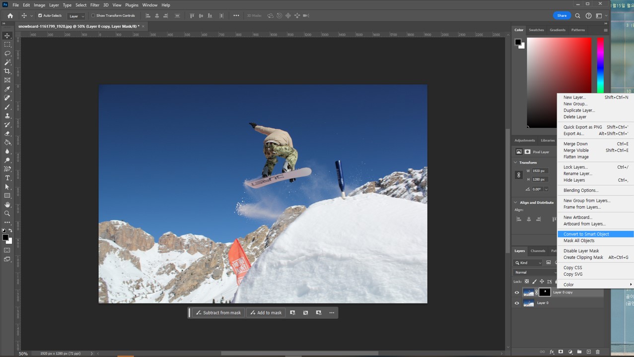 보드 점프해서 눈날리는 사진