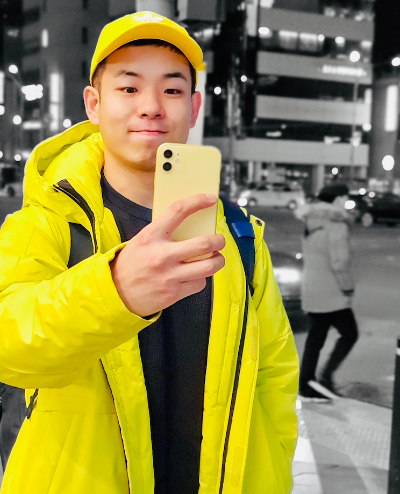 Man holding an iPhone Yellow