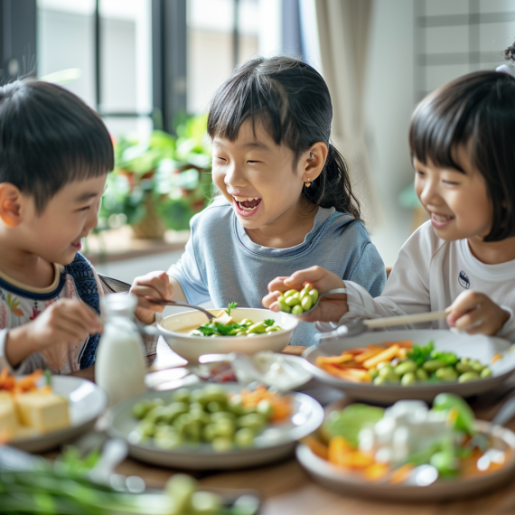 두부, 완두콩, 두유 등 콩으로 만든 음식을 식탁에서 즐겁게 먹고 있는 아이들의 모습. 배경은 밝고 쾌활한 주방이나 식당입니다.