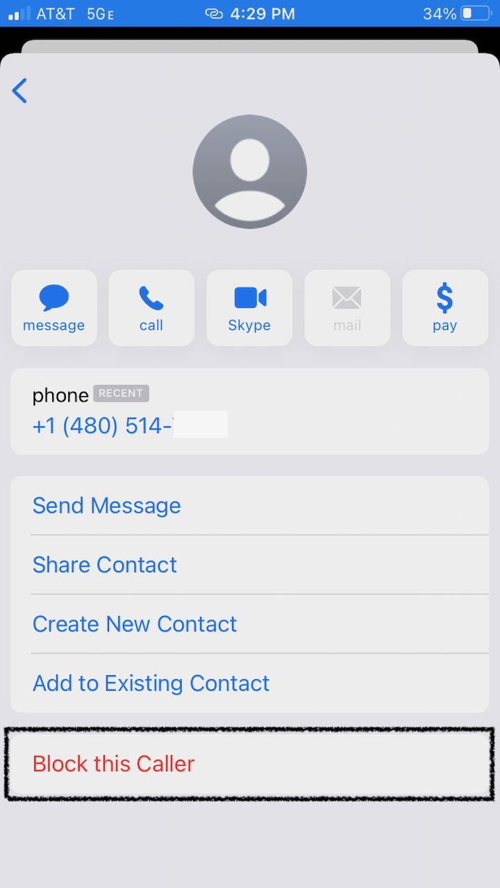 screenshot of iPhone Message&#44; showing an option to block the caller