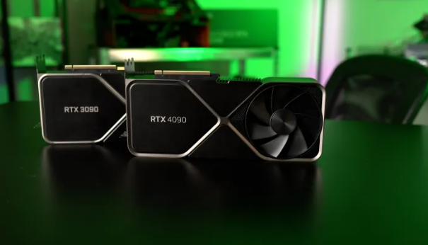 테이블 위에 나란히 놓인 RTX 4090과 RTX 3090