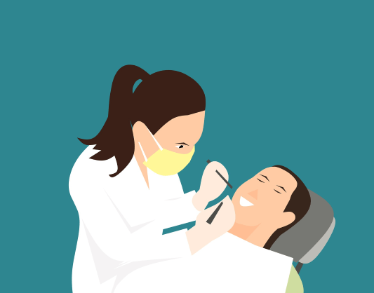 의사가 환자의 치아를 치료하고 있는 사진