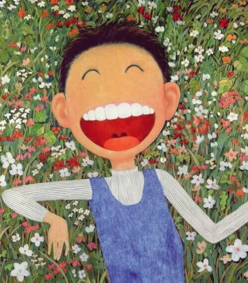 꽃밭에 누워 웃는 아이