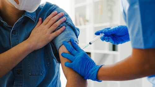 herpes-vaccine-shot-senior-male-patient