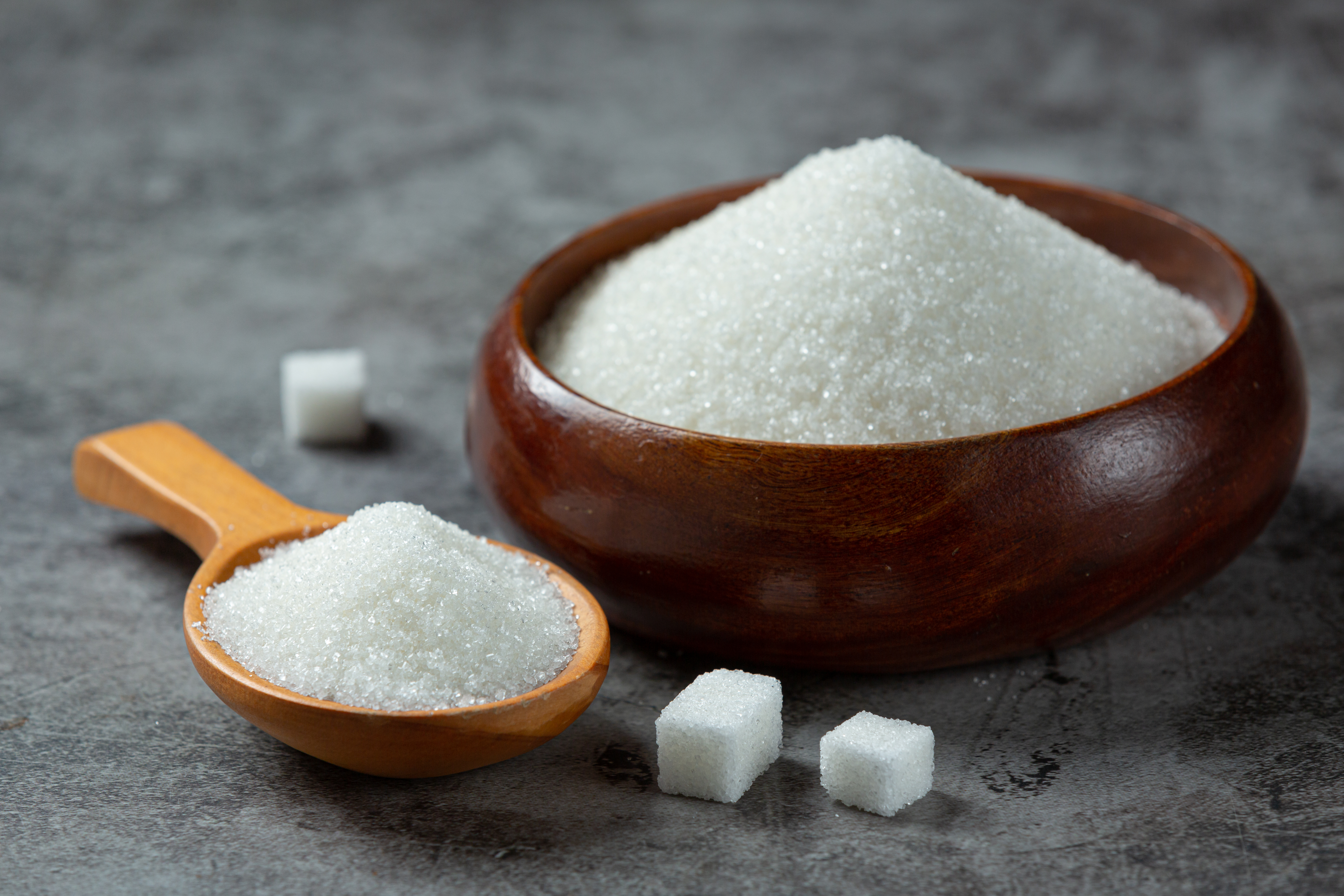 world-diabetes-day-sugar-wooden-bowl-dark-surface1