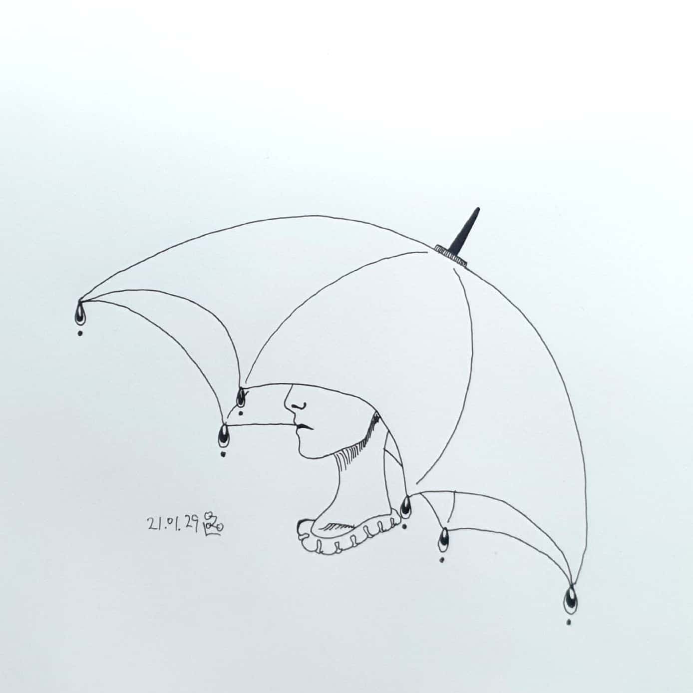  우산을 쓴 얼굴