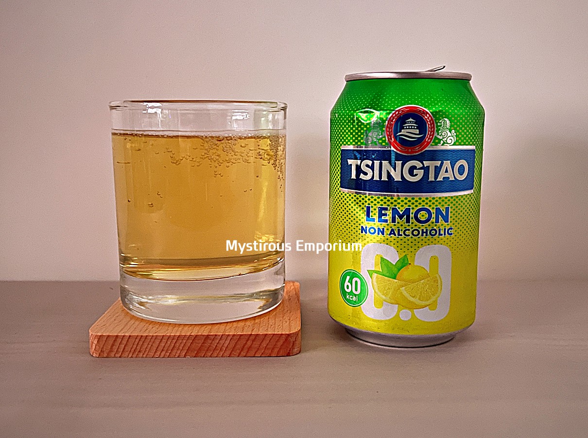 칭따오 레몬 논 알콜릭 맥주 거품 없음을 나타낸 사진