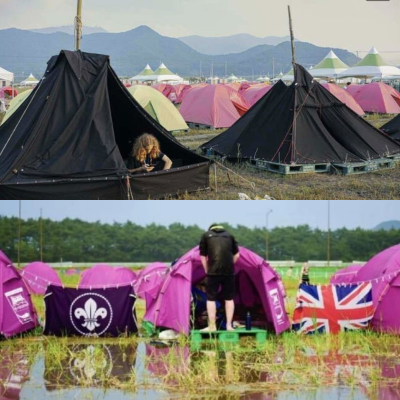 극한의 환경에서 텐트를 설치한 잼버리 참가자들