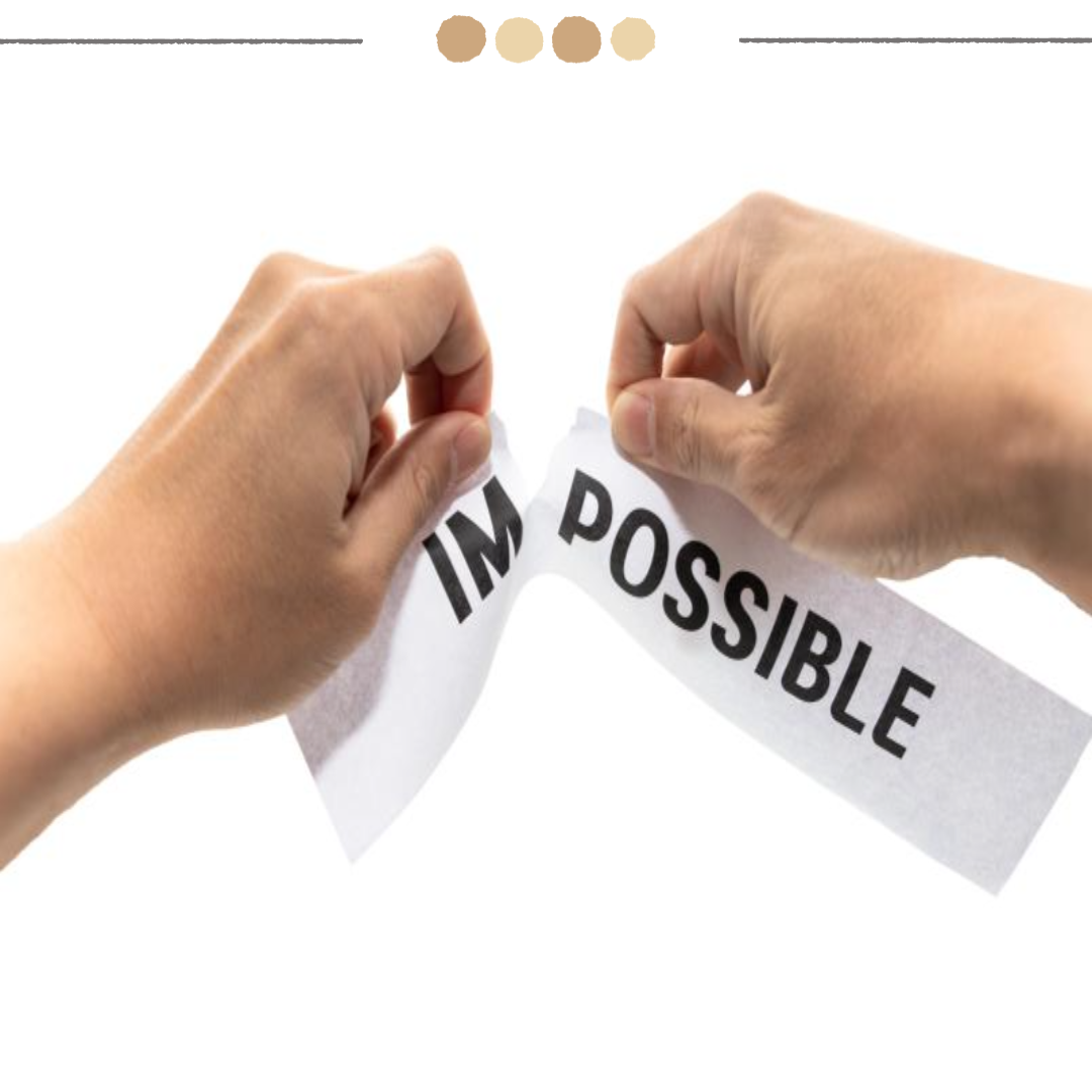 종이에 적힌 impossible 문구를 찢는 이미지
