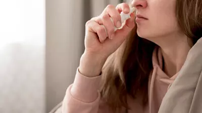 woman-taking-treatment-runny-nose