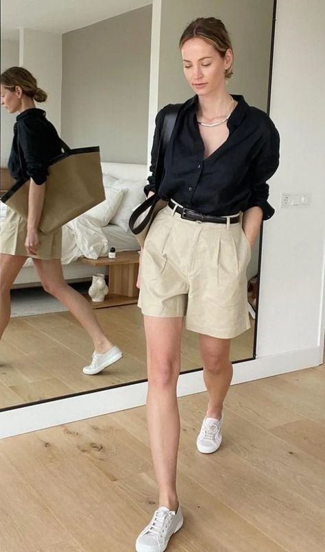 black_shirt_and_beige_shorts