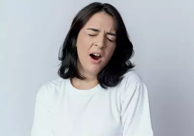 girl-yawning-with-closed-eyes-isolated-white-background