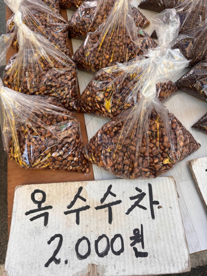 K-corn tea packs sold for 2,000 KRW at Yongmun Market.