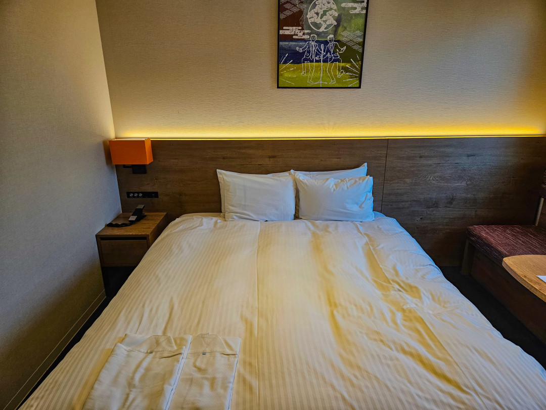 오사카 포르자호텔 침대 가운