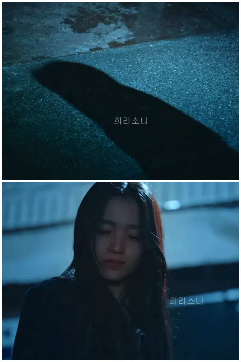 그림자를 보며 빙긋 웃는 산영.