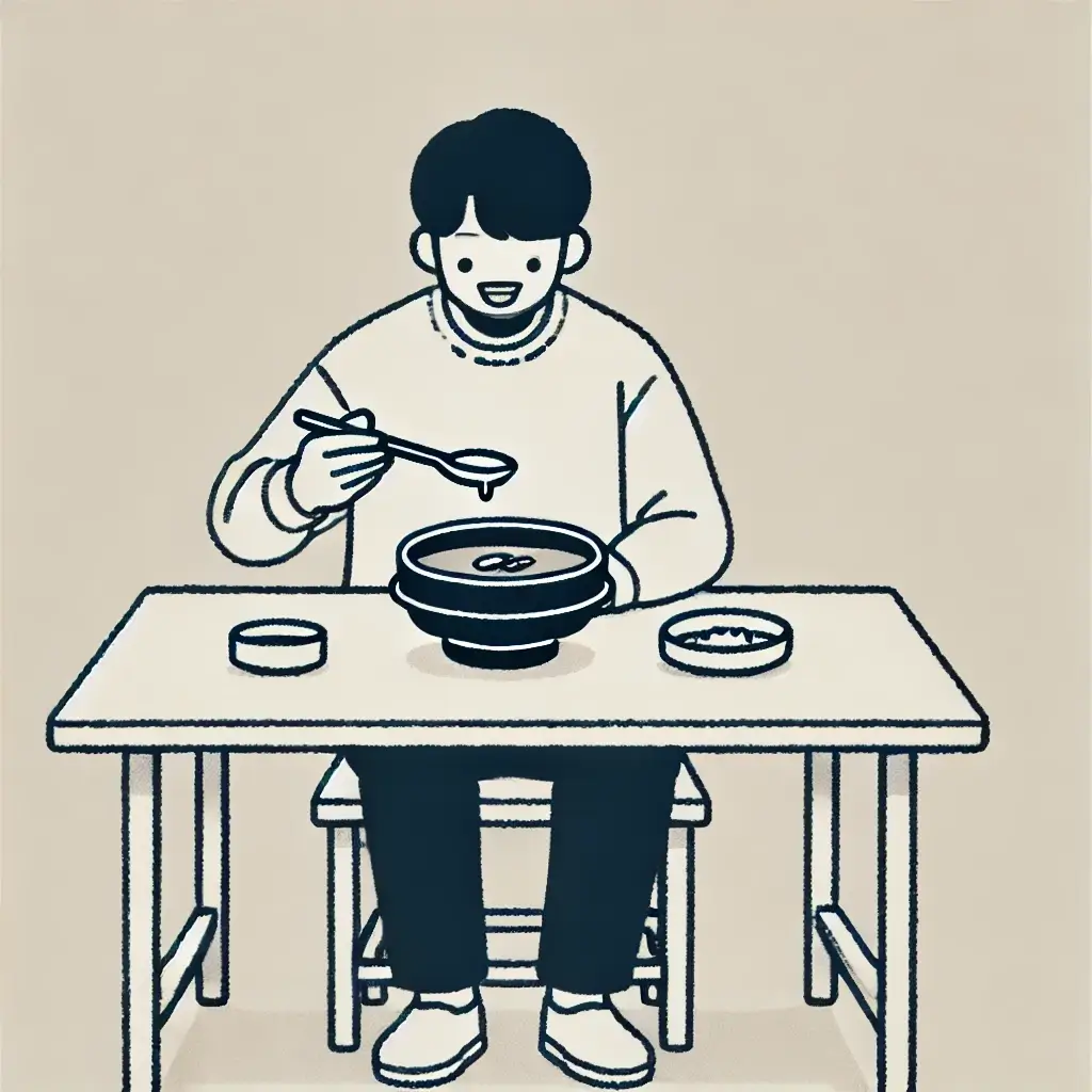 해장국을 맛있게 먹고 있는 남자의 모습.