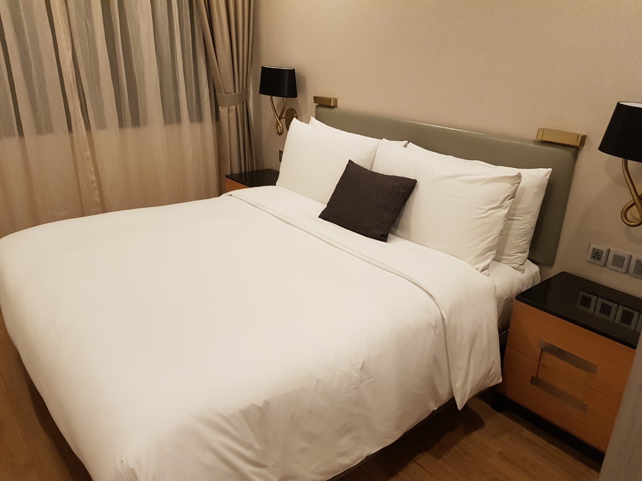 호치민 호텔 및 서비스 아파트 오크우드 레지던스 사이공(7군) - 침실