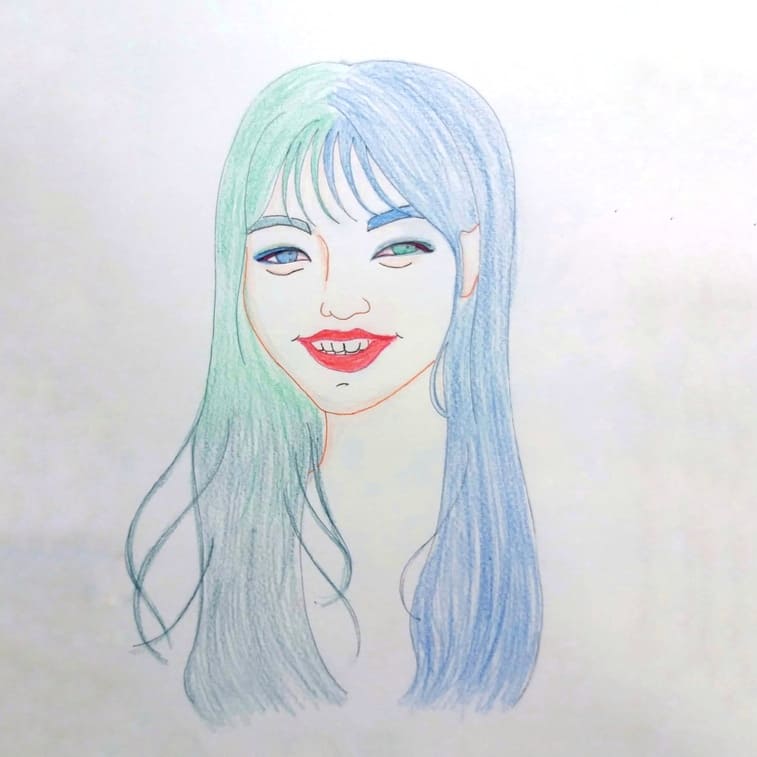  두가지 색깔로 머리카락을 염색한 여성의 얼굴