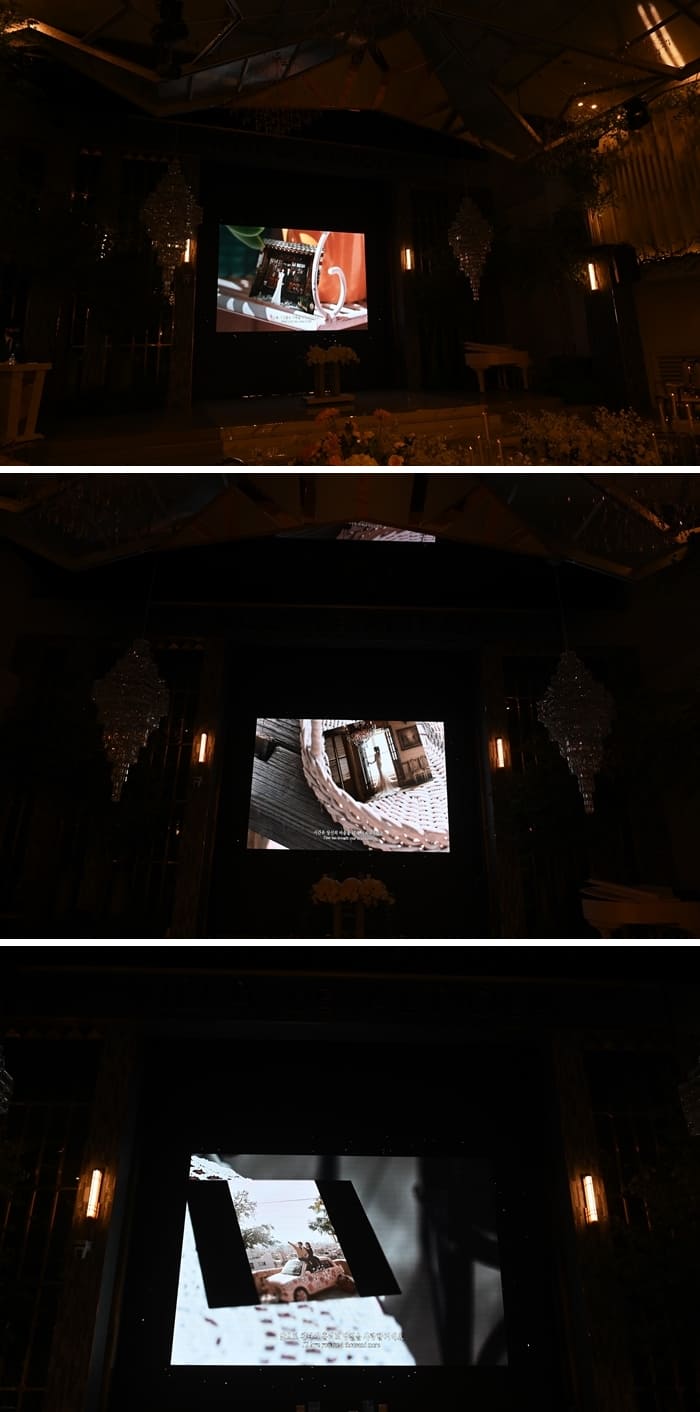빌라드알티오라-웨딩홀에서-식전영상이-재생되고-있는-모습-사진