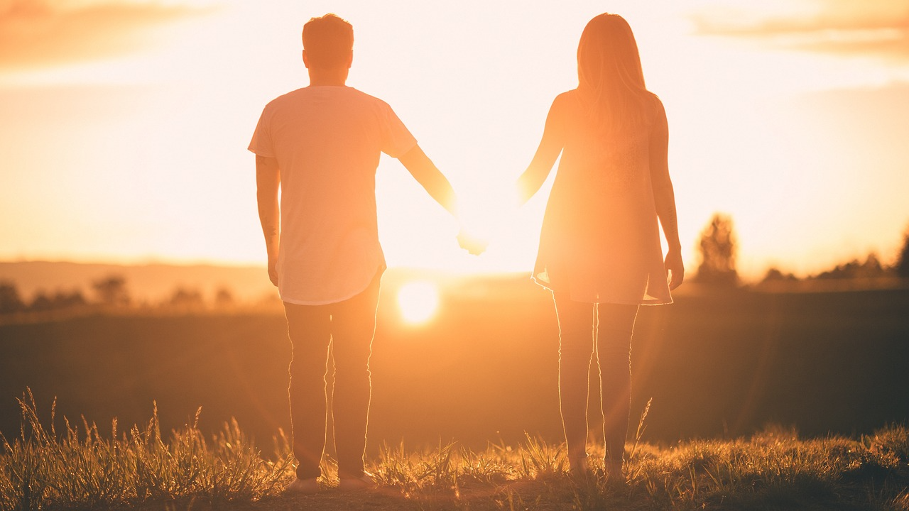 People&#44; Holding hands&#44; Sunset image.