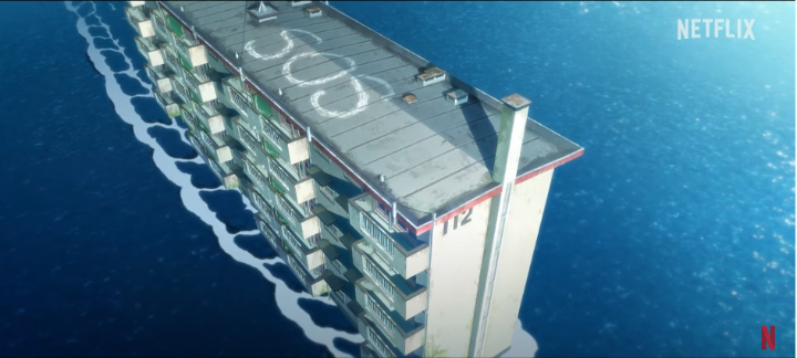 바다위를떠다니는아파트_옥상에하얀색SOS표시가되어있다.