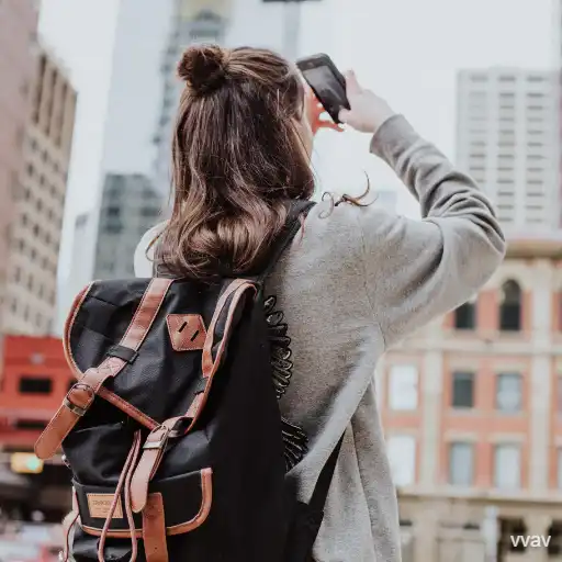 female traveler taking pictures