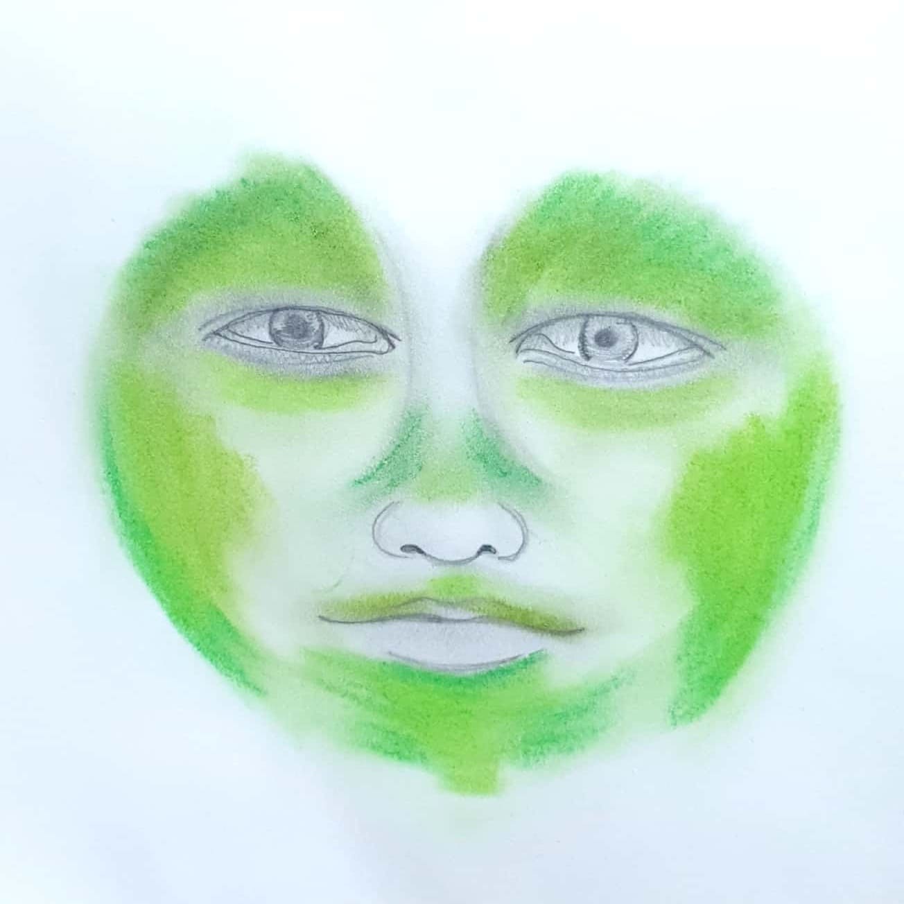  눈과 콧대, 입술이 부드럽게 번진 얼굴의 모습