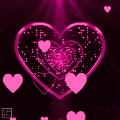핑크빛 하트들이 빛나는 따뜻한 배경의 움직이는 이미지