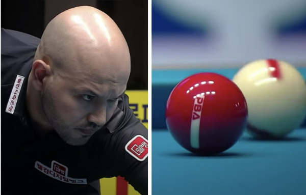 PBA프로당구선수 비롤위마즈 선수가 PBA공인 쓰리쿠션 당구공(공인구)를 바라보고 있습니다.