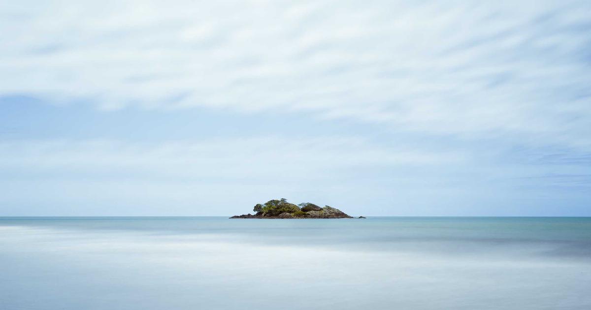 person preparing healthy anti-inflammatory meal in modern kitchen