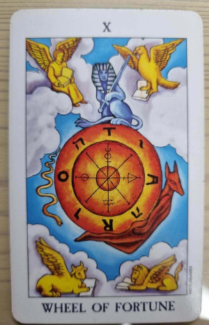 타로10번 운명의수레바퀴 그림설명
