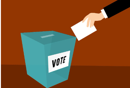 투료를-하고-있는-사람의-팔과-투표함