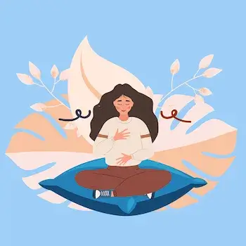 푹신한 방석에 편안하게 다리를 포개고 앉아 눈을 감고 편안하게 미소 지으며 두 손을 가슴과 배에 얹고 호흡에 집중하며 느끼는 여성.