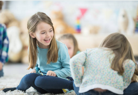 child playing alone to social interaction