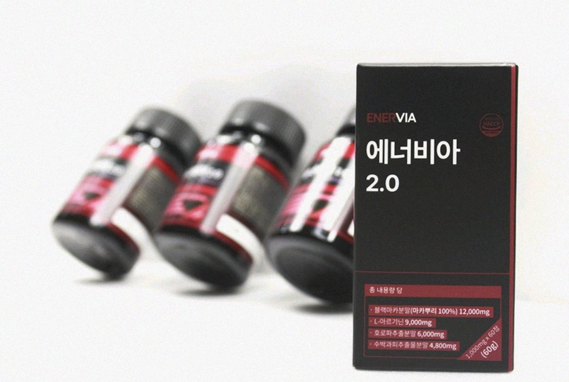 Korean Asian man organizing daily supplements with water bottle