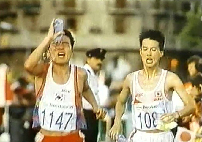 황영조 2:08:09 기록과 페이스를 상징적으로 보여주는 이미지