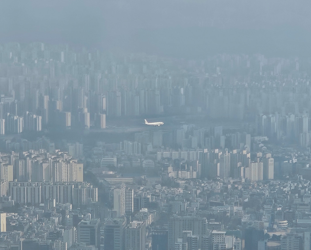 잠실 롯데타워 비행기 착륙