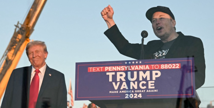 머스크가 오른팔을 올리고 있다.