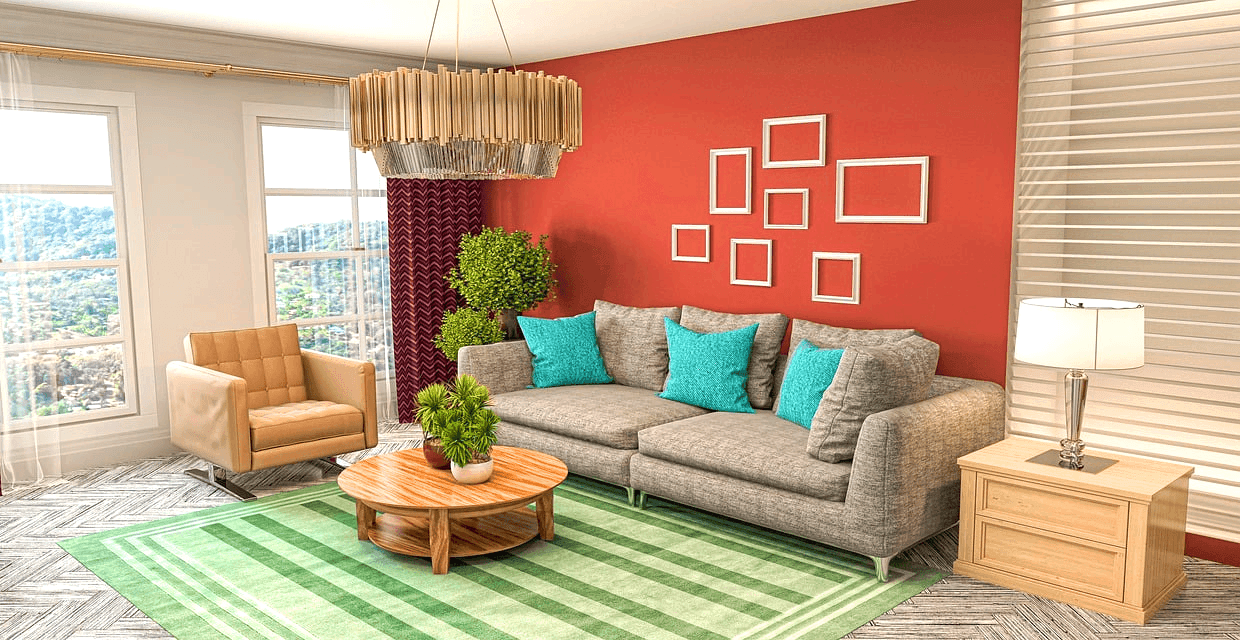 아파트 거실 풍경이다. 회색 소파가 았고 벽은 다홍색이다. 바닥은 연두색 카펫이 깔렸다.